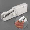Mini Portable Handheld Sewing Machine. 