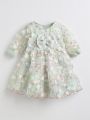Eid Special Elegant and Fancy frock for baby girls Light Green Floral Net Frock with Matching Hairband & Trouser – 2-3 Years Baby Girl Dress. 