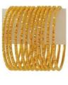 Set of 12 - 18K Gold Plated Bangles. 