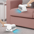 Portable handheld bed vacuum cleaner. 