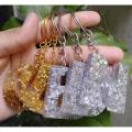 1x keychain- golden / silver- Initial keychain- glittered with foil- fancy keychain- Resin- Epoxy. 