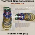 Traditional Marble Glass Bangles / Crystal Karay  in MultiColour available in size of 60 mm (2.4/ Do ) 65 mm (2.6/ Sawa Do ) , 70 mm ( 2.8/ Dhai) for girls and women. 