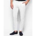 White Cotton Men Slim Fit Chinos. 