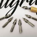 Keep Smiling 8 Pcs Set 7 Calligraphy Dip Pen Set Nibs, 1 Lacquered Wooden Handle and 1 Plastic Case for Nibs Suitable for All Calligraphic Writing Styles. 