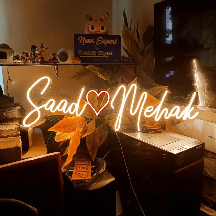 custom neon light two words or Names with heart shape beautiful design