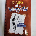Diary Of A Wimpy Kid A Novel In Cartoons by Jeff Kinny. 
