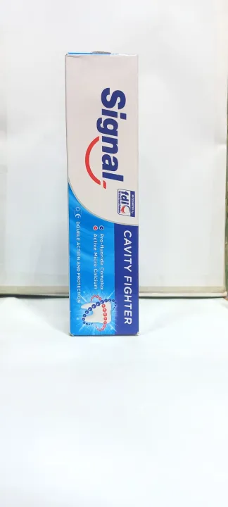 SIGNAL%20TOOTHPASTE%20ORIGINAL,%20WHITE%20Signal%20Cavity%20Fighter%20Double%20Action%20Protection%20Toothpaste%20-%20Image%204
