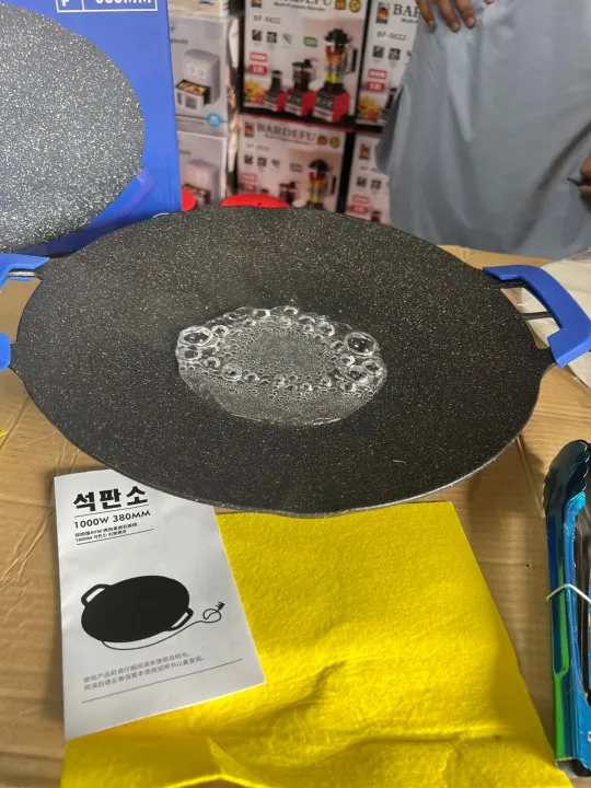 Imported%20JAPAN%20Made%20Portable%20Electric%20Tawa%2014%20Inch%20(35%20CM)%20with%20Adjustable%20Temperature%20Control%20-Ideal%20for%20Dosa,%20Roti,%20Chapati,%20Paratha,%20Naan%20-%20Large%20Non-Stick%20Surface%20-%20Safe,%20Quick%20&%20Even%20Heating,%201000%20Watts(%20BLACK%20)%20-%20Image%209