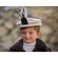 kidz Chitrali cap with feather. 