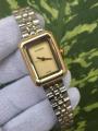 Channel Gold-Tone Rectangle Watch - Swiss-Made Luxury Timepiece with Dual-Tone Bracelet for Women. 