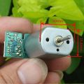 Small 12v dc motor with optical encoder sensor. 