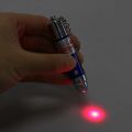 Mini Laser Light Keychain Toy – Creative Pocket-Size LED Laser Pointer with Key Ring, Multi-Function Novelty Gadget for Kids, Friends & Everyday Use, Silver Color. 