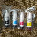 Epson 004 Original Ink Bottle Set ( Black / Cyan / Yellow / Magenta ). 