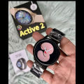 Trendhub Active 2 Smart Watch For Boys - Stylish Round Dial Touchscreen Smart Watch For Girls with Elegant Metal Chain Strap - Fashionable Smartwatch with a Unique Floral Display Design - Available in Gold, Black, and Silver Colors. 