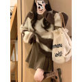 Contrast striped sweater for women with a lazy and loose soft long sleeved knitted top. 