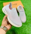 Step into Comfort Performance Women's Go Walk Lite Solace Walking Canvas Shoes and Sneakers for Effortless Style and Support. 