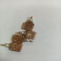 Golden colour square shape glitter stone size is 14/14 for sale in very reasonable price.. 