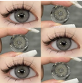 Eye contact lense eye care lense party wear lense in light grey. 