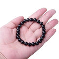 Black stone hand beats bracelet for men. 