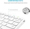 Anker Ultra Compact Slim Profile Wireless Bluetooth Keyboard for iOS, Android, Windows and Mac with Rechargeable 6-Month Battery (White). 