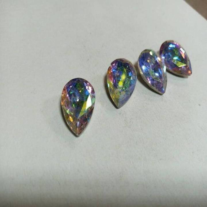 White multi colour stone almond shape size is 13/18 for sale in very reasonable price.