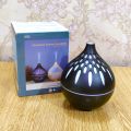 Ultrasonic Aroma Humidifier ( 7 Color Changing LED Lights ). 