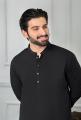Black Stitched Kurta Pajama for Men: A Timeless and Classy Traditional Attire. 