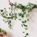 Best artificial leaves plants garland green leaf bail 7 ft approx. natural look for decoration/ Green leaf garland/Wedding decor/ Bedroom decor/ Birthday decor/ Garden party decor/ Fake hanging plants/ Foliage green leaves ribbon/Wall garden. 