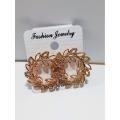 Decent Round earrings with leaf patterns. Aesthetic earrings for girls.. 