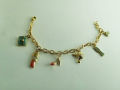 Beautiful Charm Golden Barbie Style Bracelet With Cute Shoe, Bag, Clutch, Lipstick, Comb and Perfume Pendant For Girls Best For Gift. 