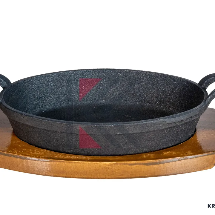 cast%20iron%20Sizzler%209"%20(22.7%20CM),%20Oval%20Deep%20with%20Wooden%20Base,%20Krucible%20Kitchen,%20Cast%20Iron%20Naturally%20Non%20Stick,%20Serving%20-%20Image%202