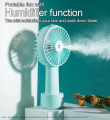 Mini Portable Water Spray Mist Fan Air Humidifier USB Small Handheld Fan Cooler USB Rechargeable Cooling Fan with mobile stand holder. 