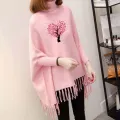 "Stay Warm and Stylish with a Winter Fleece Poncho for Women - Woman's Winter Style Printed Poncho - Premium Quality". 