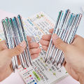 Weiyahui four-color gel pen multi-color integrated student note-taking brush pen, color handbook pen, black pen module pen. 