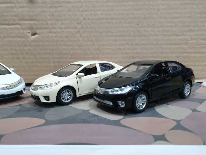 Toyota%20Corolla%20Grande%201:36%20scale%20diecast%20model%20toy%20car%20collection%20Random%20Color%20pull%20back%20action%20-%20Image%202