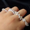 Set of 5 White Beaded Rings. 