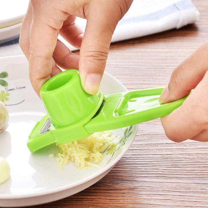 Garlic%20Peeler%20Practical%20Utility%20Kitchen%20Gadget%20%20Peeling%20Garlic%20Peeling%20Garlic%20Presses%20-%20Image%202