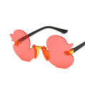 Fashion Rimless Children's Sunglasses Cartoon Duck Shape Kids Shade Cute Glasses Party Decorative Glasses for Child UV400. 