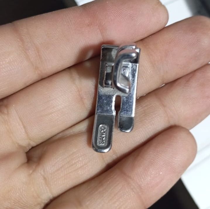 Sewing%20Machine%20Foot%20Set%20%E2%80%93%20Multipurpose%20foot%20for%20hemming,%20piping,%20and%20sewing%20(Pack%20of%204).%20-%20Image%206