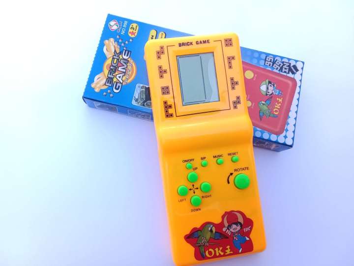 Childhood%20Classic%20Fun%20Tetris%20Hand%20Held%20Electronic%20Game%20Toys%20Brick%20Game%20NEW%20%7C%20Kids%20Electronic%20Tetris%20Game%20Handheld%20Game%20Machine%20LCD%20Educational%20Toys%20%7C%20Kids%20Super%209999%20in%201%20Multi%20Color%20(Cell%20Operated)%20-%20Image%205