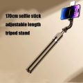 4 IN 1 R1SL Selfie Stick Bluetooth Remote Desktop Stand Portable Stretchable Holder Anti-Shake Stabilizer Mobile Holder Handle Retractable Portable Multi-functional Cellphone Grip Holder Tripod Stand for Mobile Phone Self-Timer With LED Light 5.7FT Height. 