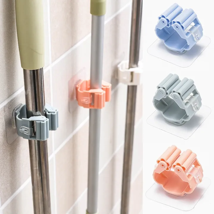 Wall%20Mounted%20Mop%20&%20Broom%20Holder%20%E2%80%93%20Self-Adhesive,%20Waterproof%20Multi-Tool%20Organizer%20Rack%20with%20Hooks%20%E2%80%93%20No%20Drill,%20Space-Saving%20Storage%20Solution%20for%20Kitchen%20&%20Bathroom%20Cleaning%20Tools%20-%20Image%204