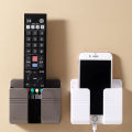 Wall Mobile Phone Charging Stand Remote Control Punch-Free Holder. 