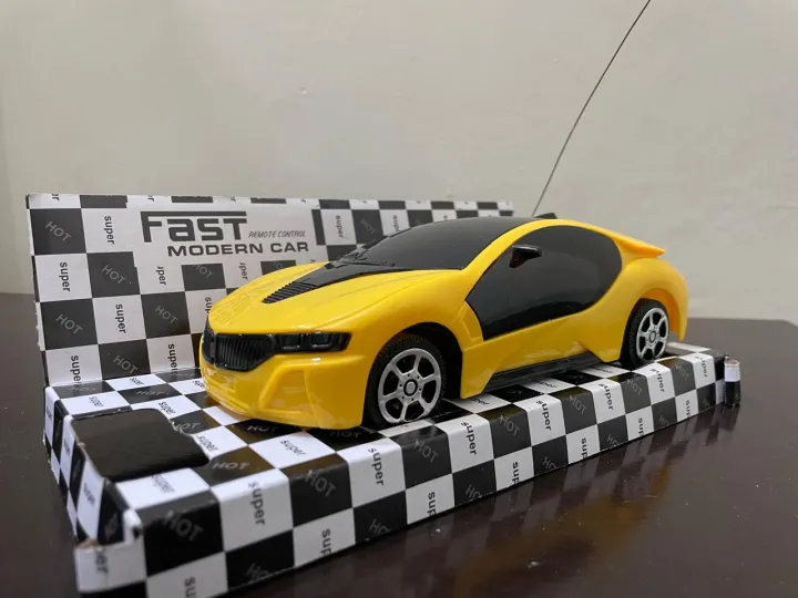 Remote%20Control%20High%20Speed%20Racing%20Car%20with%20Stylish%20Looks,%20Two%20Functions%20&%20Modern%20Design,%20RC%20Vehicle%20Toy%20for%20Kids%20-%20Image%203