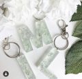 1x keychain- golden / silver- Initial keychain- glittered with foil- fancy keychain- Resin- Epoxy. 