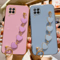COROGI for Samsung Galaxy M33 5G Back Cover + Love Heart Bracelet Chain Luxury 6D Plating Soft Case Camera Lens Protection Square Frame Silicone Glossy Mobile Phone Cases. 