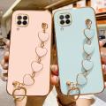 COROGI for Samsung Galaxy M33 5G Back Cover + Love Heart Bracelet Chain Luxury 6D Plating Soft Case Camera Lens Protection Square Frame Silicone Glossy Mobile Phone Cases. 