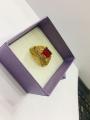 Ring gold plated one carat with white stones and ruby for women. 