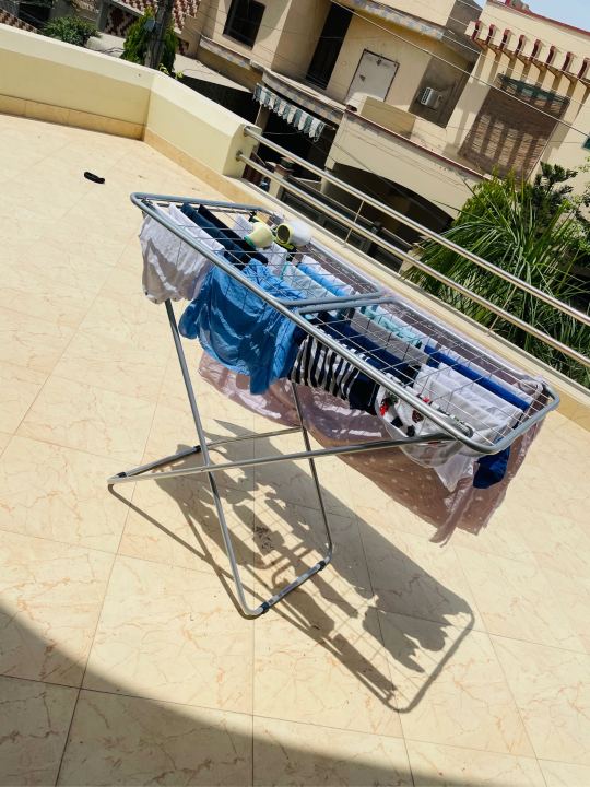 Sturdy%20Laundry%20Drying%20Rack%20%E2%80%93%20Foldable%20Wet%20Clothes%20Stand%20with%20Multiple%20Hanging%20Rods%20for%20Efficient%20Air%20Drying%20-%20Image%206