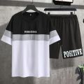 Summer Men Letter Graphic Color Block Tee & Drawstring Waist Shorts Track suit for Summer. 